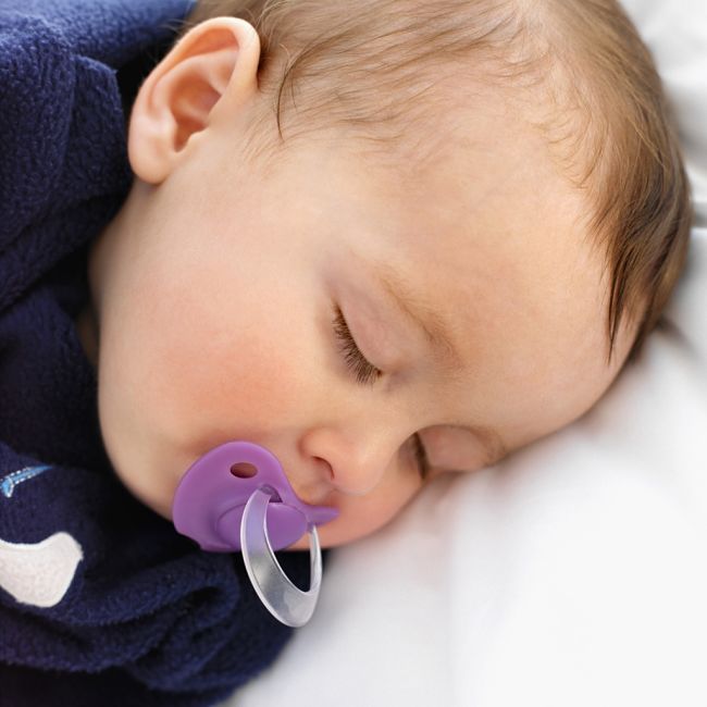 The wean your baby off a pacifier start by only allowing it be used to help the baby fall asleep