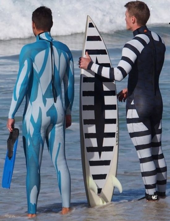 Stealth wetsuit designs either blend into the water scape or mimic the warning colors and patterns used by fish. They also 'break' the outline of objects and make them less visible in this way.